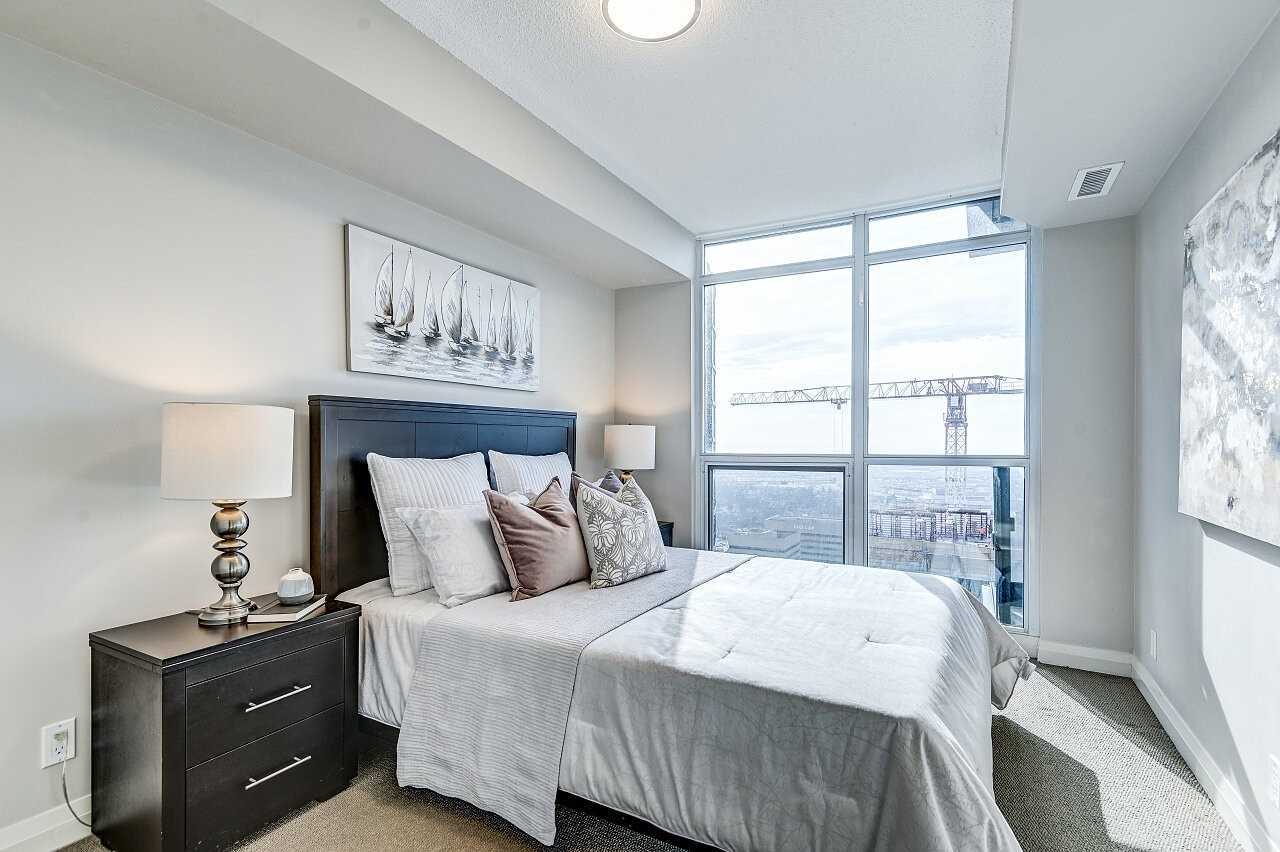 Professionally staged Toronto condo bedroom
